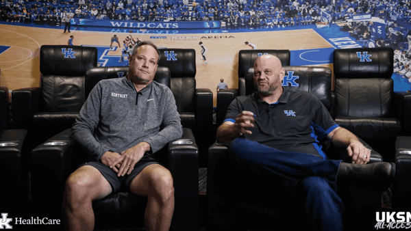 Mark Fox and Cameron Mills break down practice footage (Photo via UK Sports Network and UK Athletics)